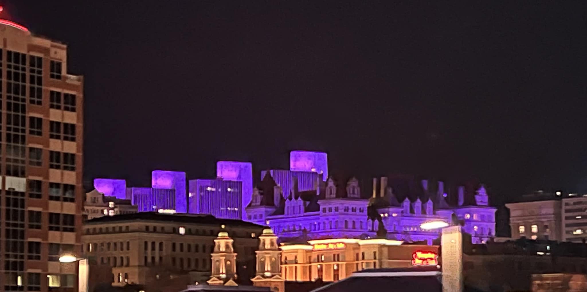 Albany New York Skyline with buildings lit up in purple for epilepsy awareness month
